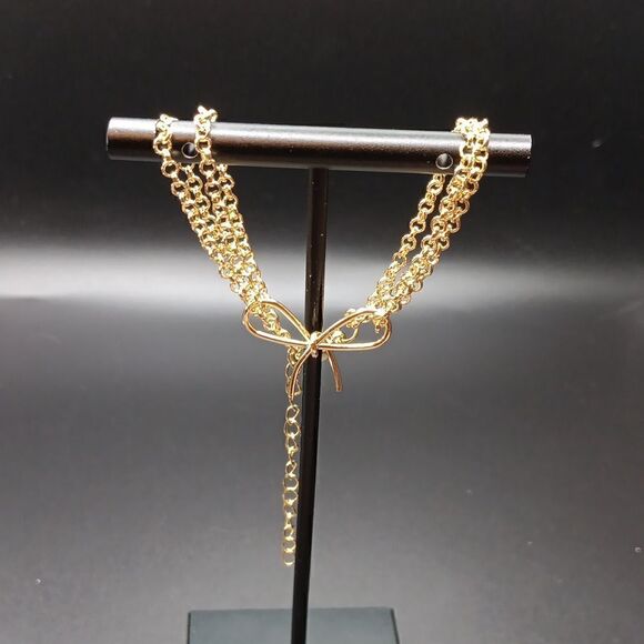 New Double Strand Bow Tie Charm Bracelet Goldtone Women's - Picture 2 of 3